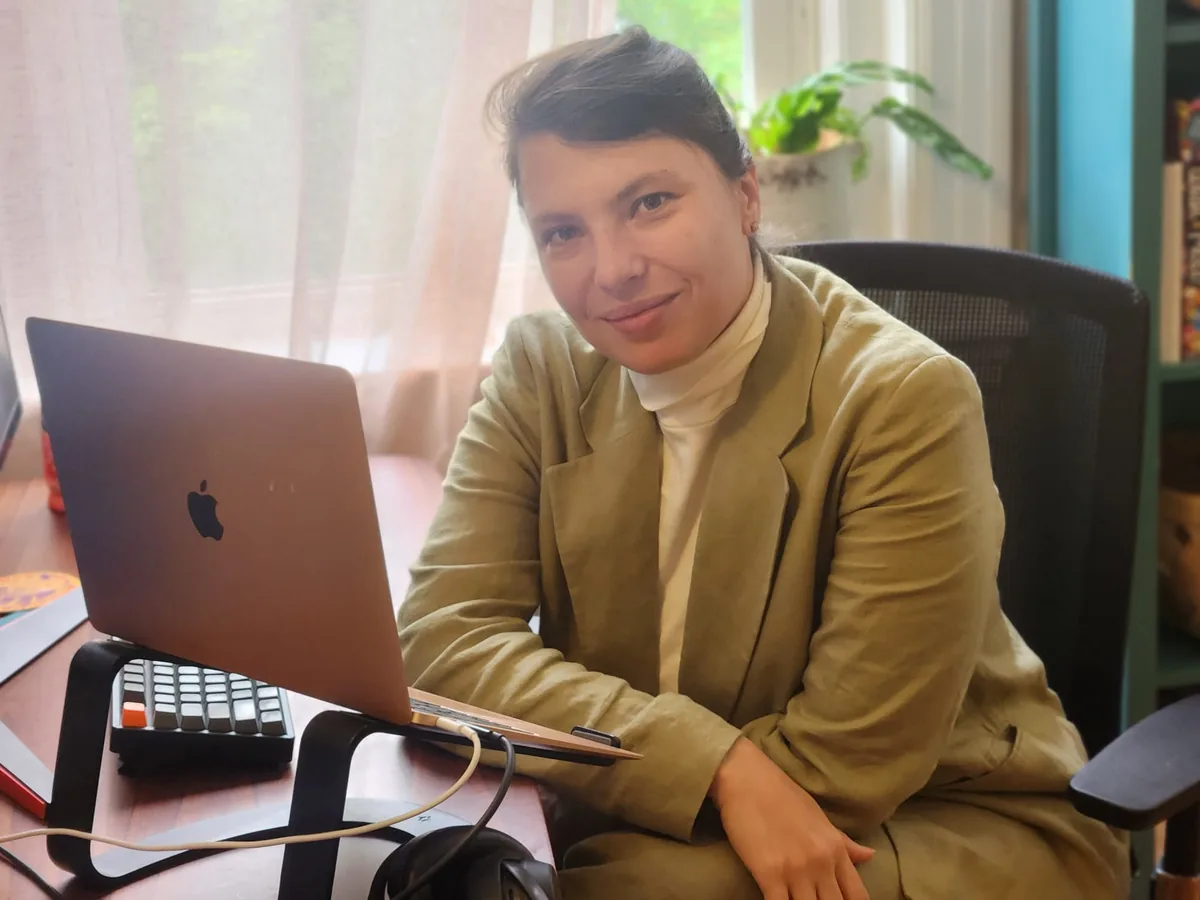 Masha Kartashev, a therapist with dark hair, smiling